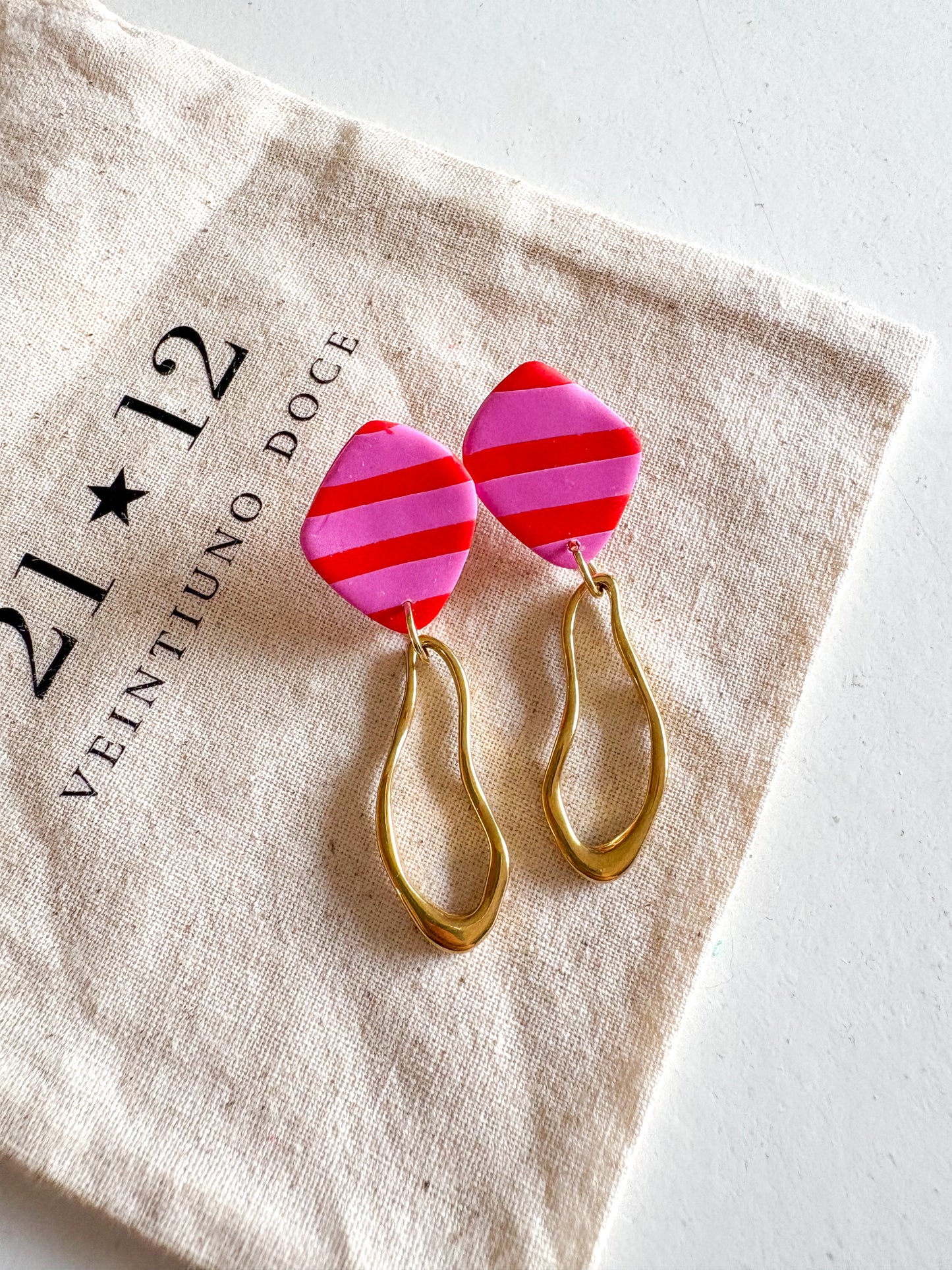 Aros Nin Rayas Rosado / Rojo