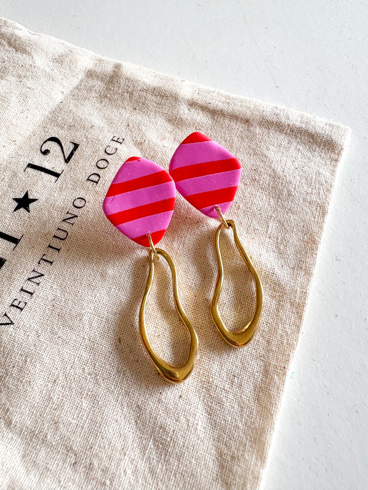 Aros Nin Rayas Rosado / Rojo