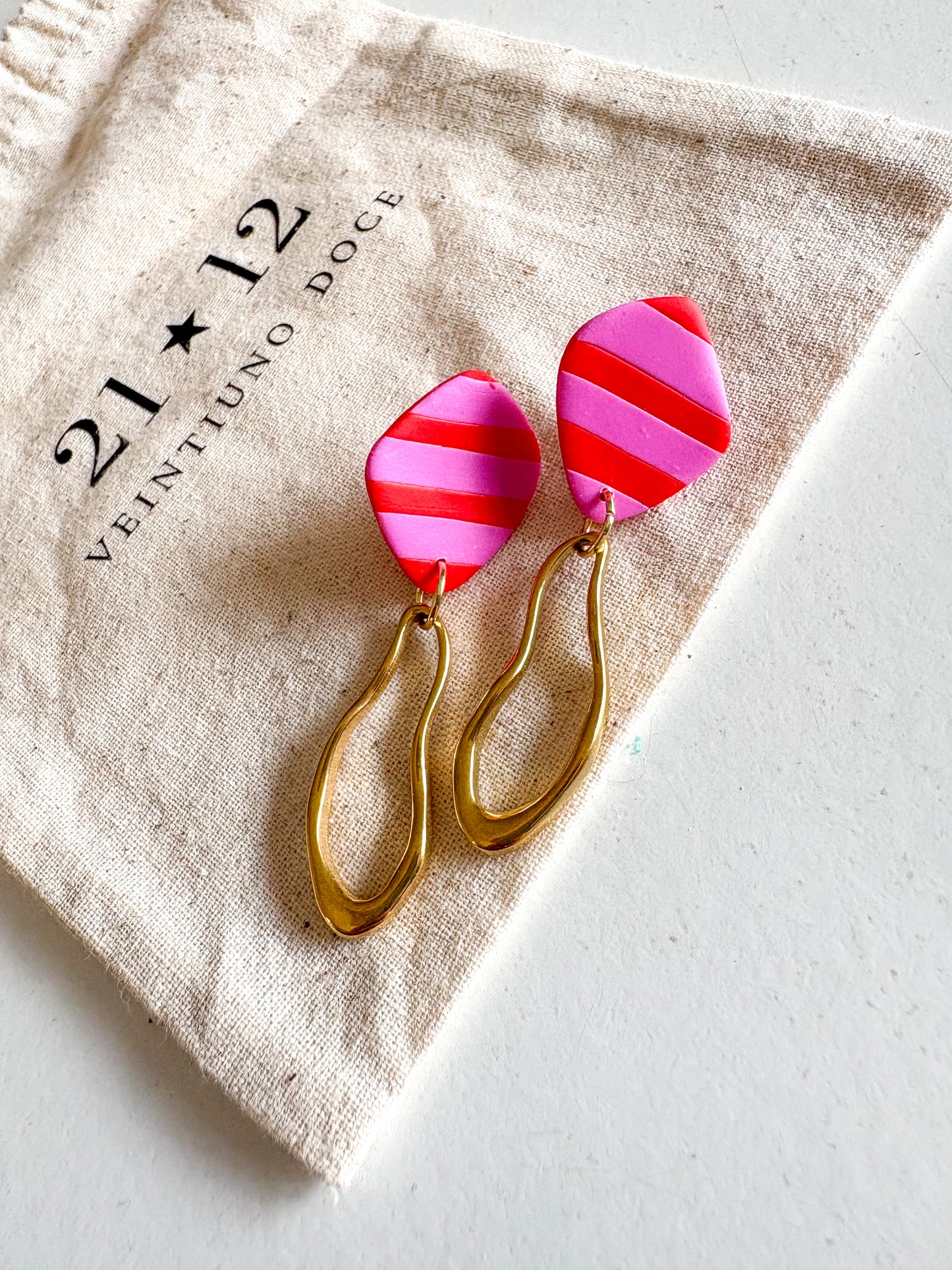 Aros Nin Rayas Rosado / Rojo